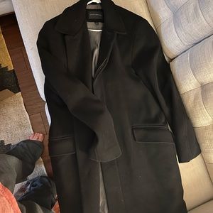 Black coat. Great condition. Only worn a couple times. Size large.